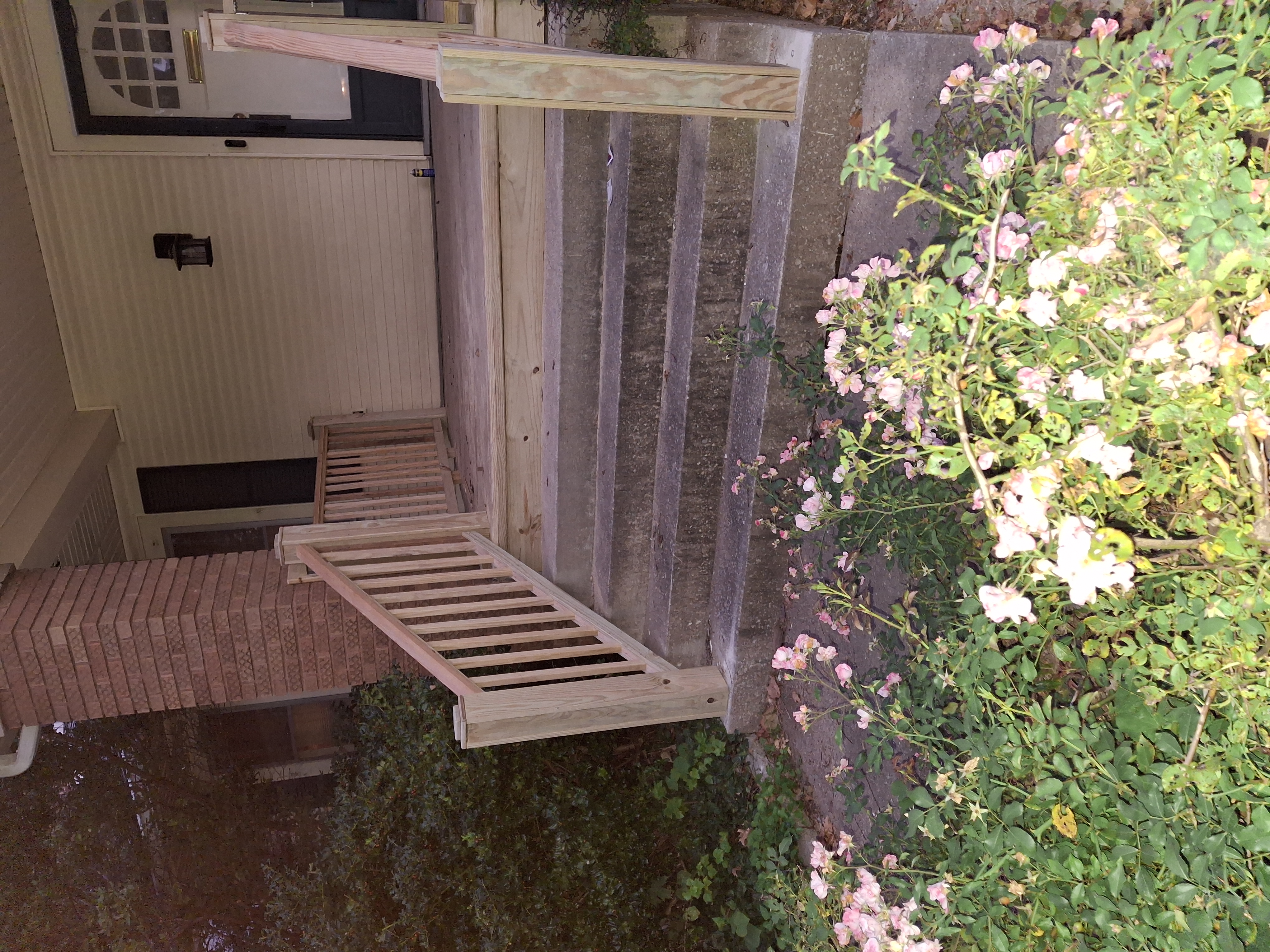 After: New cedar porch railing installed