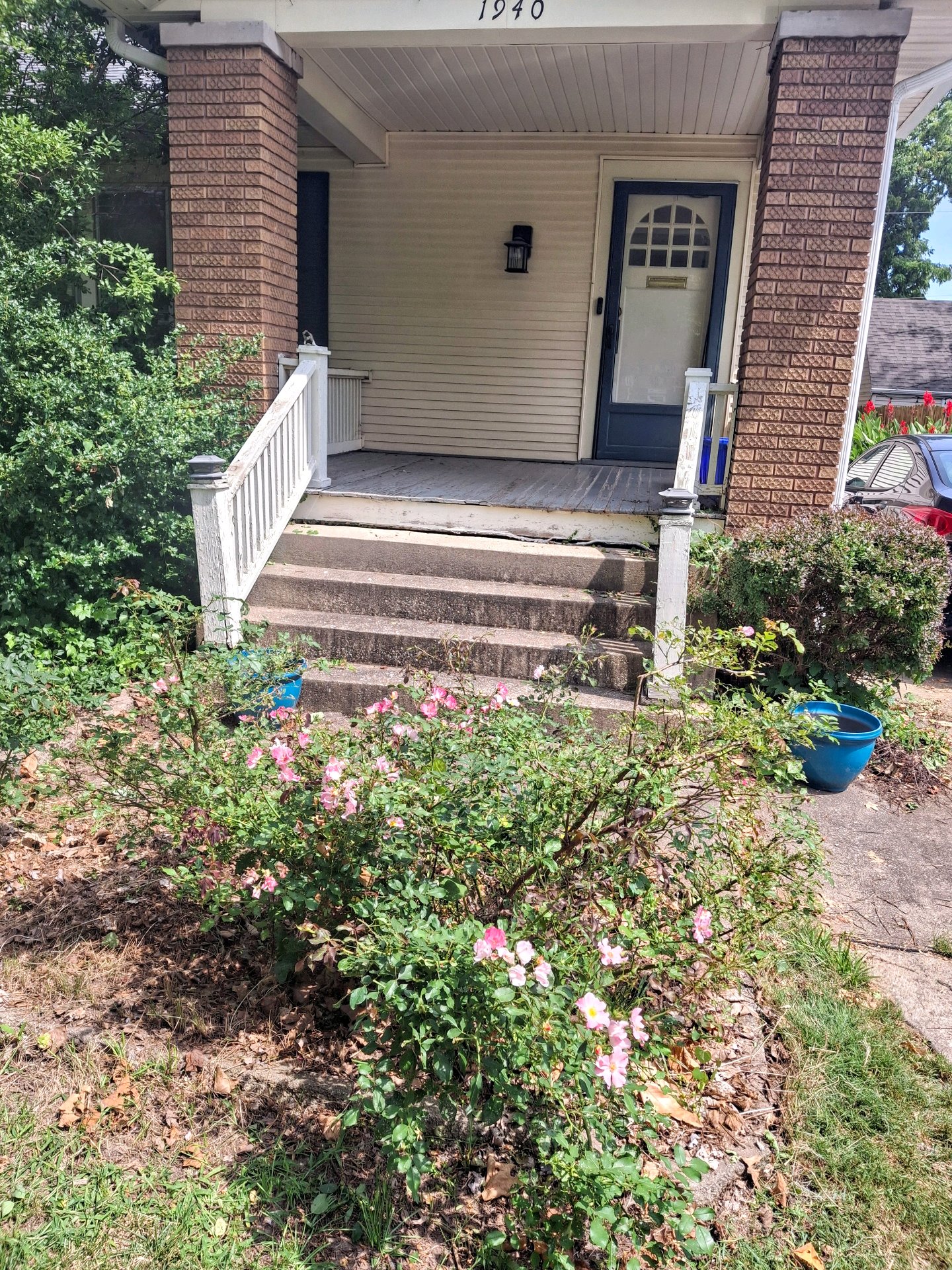 Before: Rotted porch railing